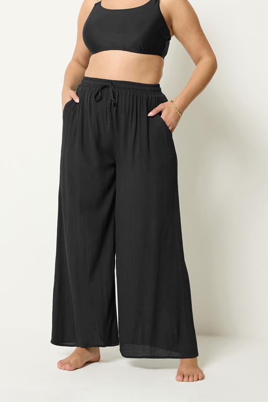 YOURS Plus Size Black Crinkle Texture Wide Leg Trousers | Yours Clothing 1