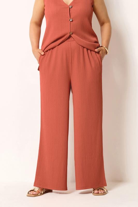  YOURS pantalones naranjas texturizados de pernera ancha 