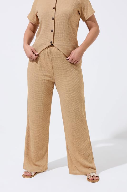 LIMITED COLLECTION Plus Size Beige Crinkle Wide Leg Trousers | Yours Clothing 1