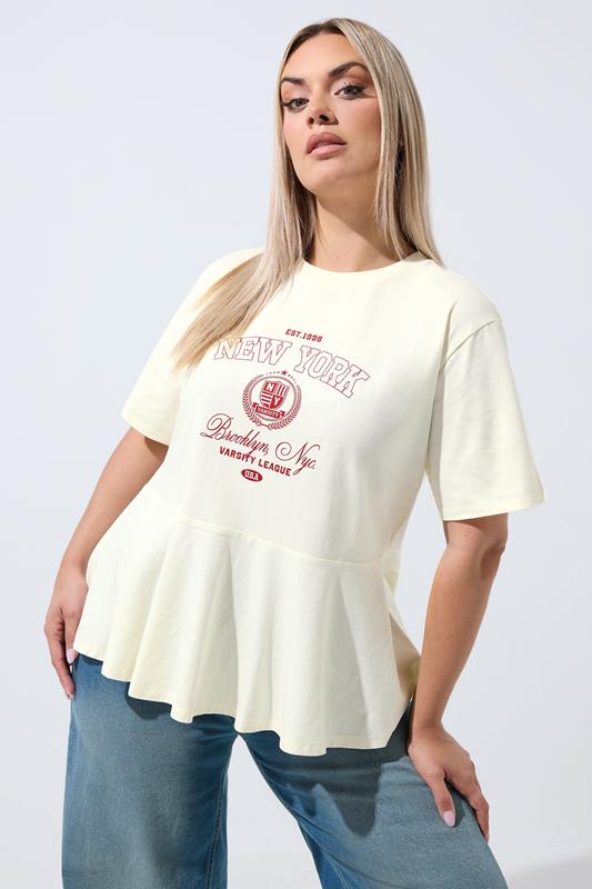  LIMITED COLLECTION ivoorwitte sportieve New York peplumtop