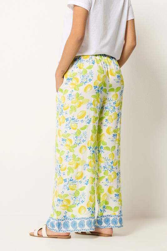 PixieGirl Petite Women's Yellow Lemon Print Wide Leg Trousers | PixieGirl 2