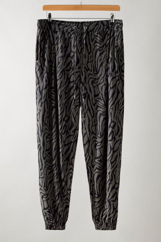 EVANS Plus Size Black Animal Markings Jersey Tapered Trousers | Evans 5