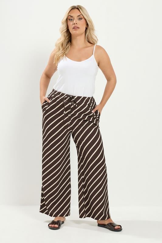 YOURS Plus Size Brown Striped Crinkle Wide Leg Trousers | Yours Clothing 1