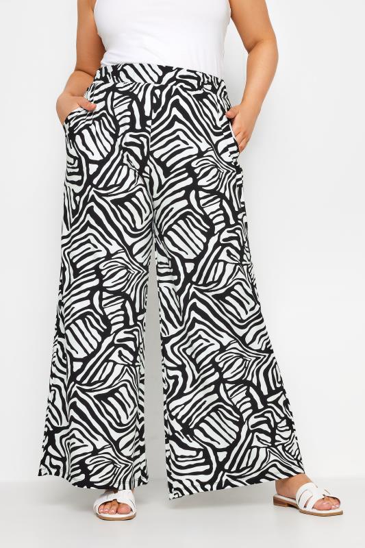 YOURS Plus Size Black Abstract Print Wide Leg Trousers | Yours Clothing 1