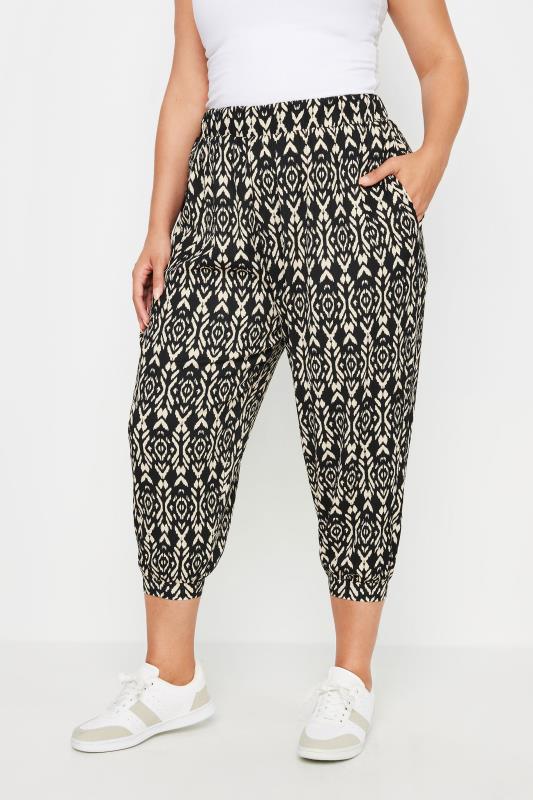 YOURS Plus Size Black Ikat Print Textured Cropped Harem Trousers | Yours Clothing 1
