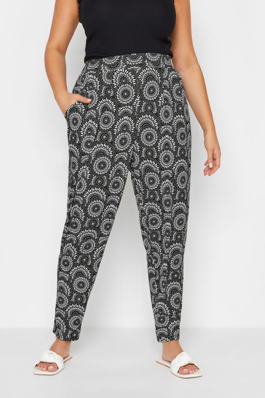 YOURS Plus Size Black Geometric Print Double Pleat Harem Trousers | Yours Clothing 1