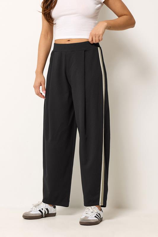 PixieGirl Petite Women's Black Side Stripe Detail Barrel Leg Trousers | PixieGirl 1