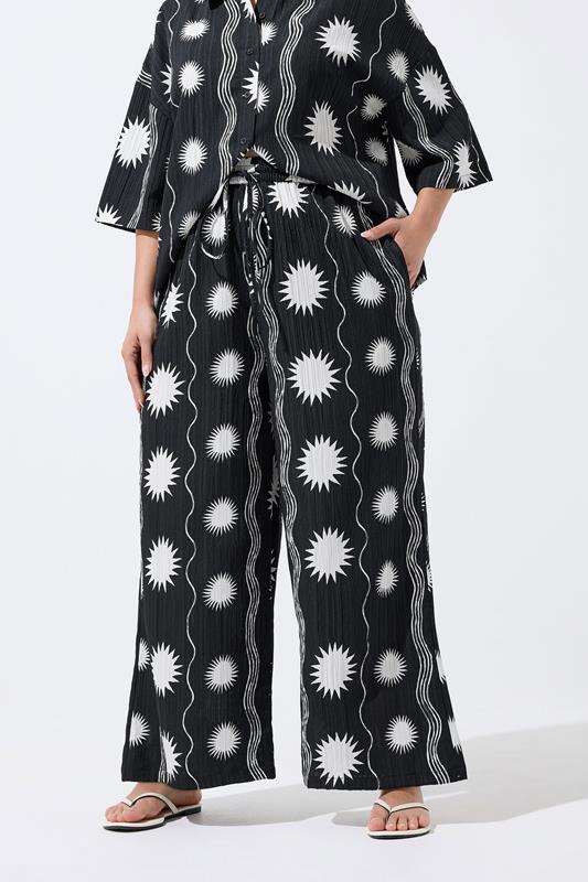 LIMITED COLLECTION Plus Size Black Sun Crinkle Trousers | Yours Clothing 1