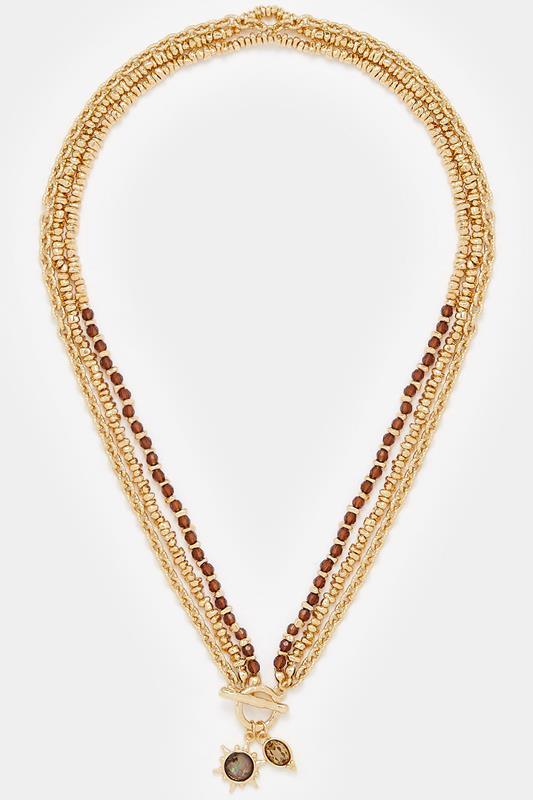  Collier doré à pendentif et chaîne perlée