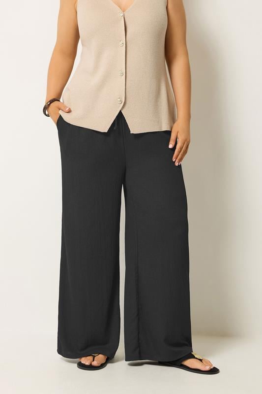 YOURS Plus Size Black Textured Trousers | Yours Clothing 1