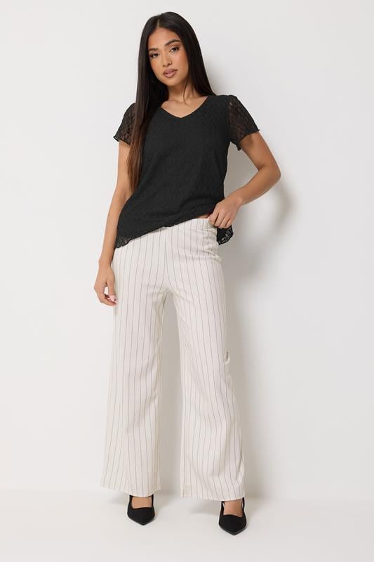  M&Co Petite Ivoorwitte gestreepte broek met wijde pijpen
