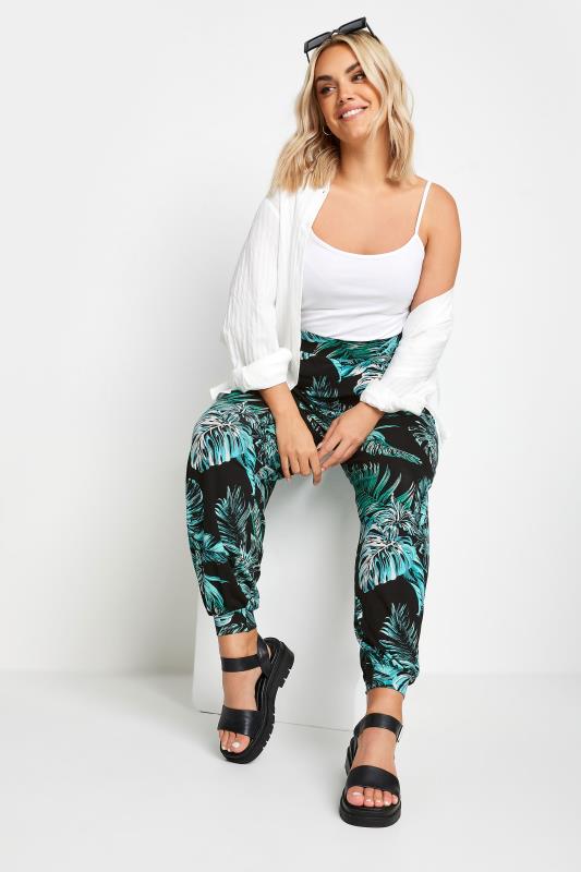 YOURS Plus Size Black Leaf Print Cuffed Harem Trousers | Yours Clothing 2
