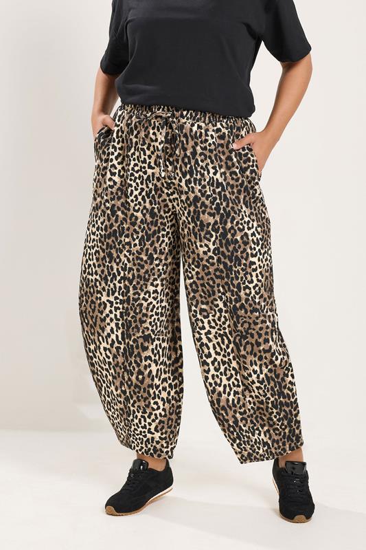 YOURS Plus Size Black Leopard Print Crinkle Barrel Trousers | Yours Clothing 1