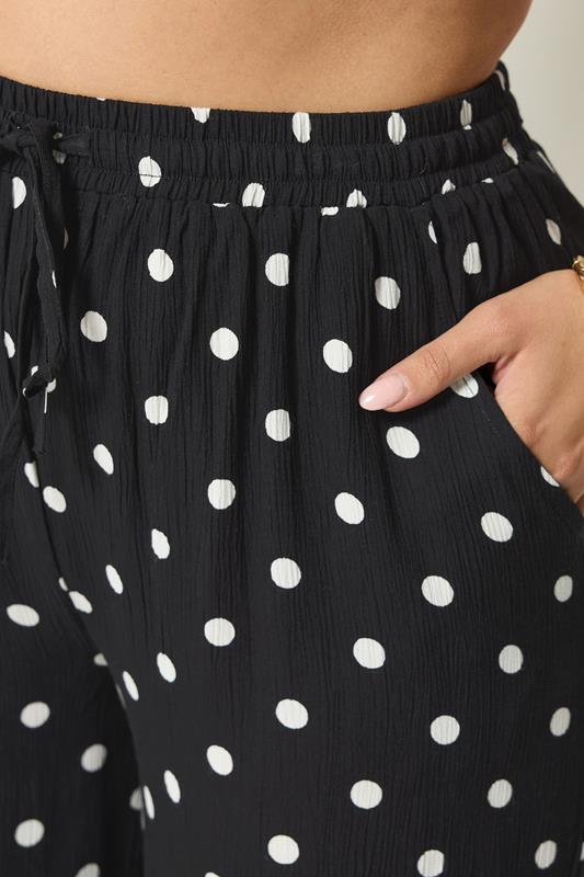 YOURS Plus Size Black Polka Dot Crinkle Beachwear Wide Leg Trousers | Yours Clothing 2