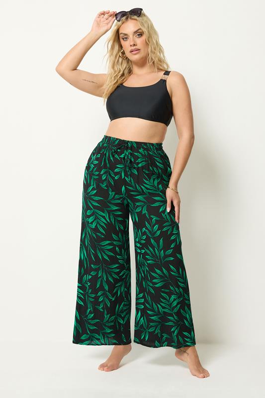  YOURS Hose mit weitem Bein in Schwarz und Grün mit Blätterprint und Crinkle-Effekt