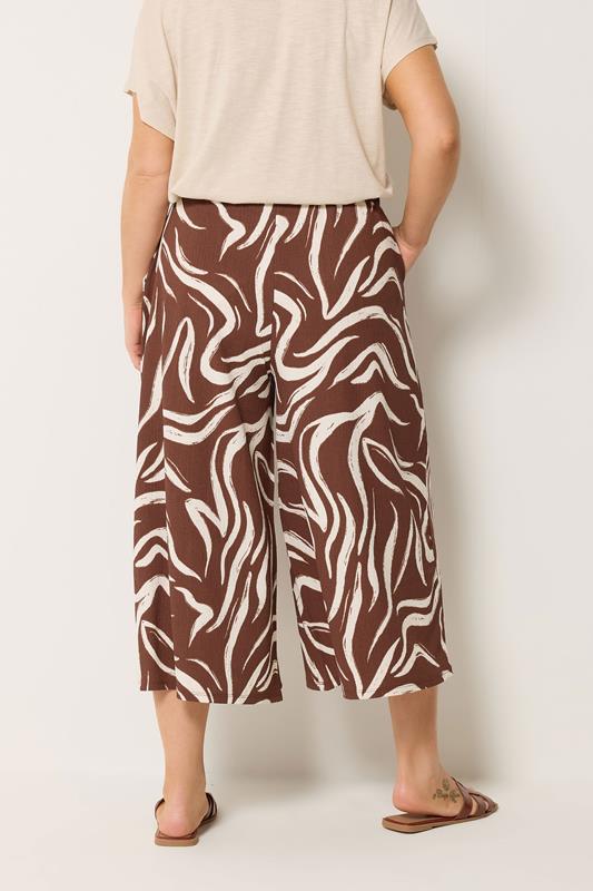 YOURS Plus Size Brown Abstract Cropped Wide Leg Trousers | Yours Clothing 2