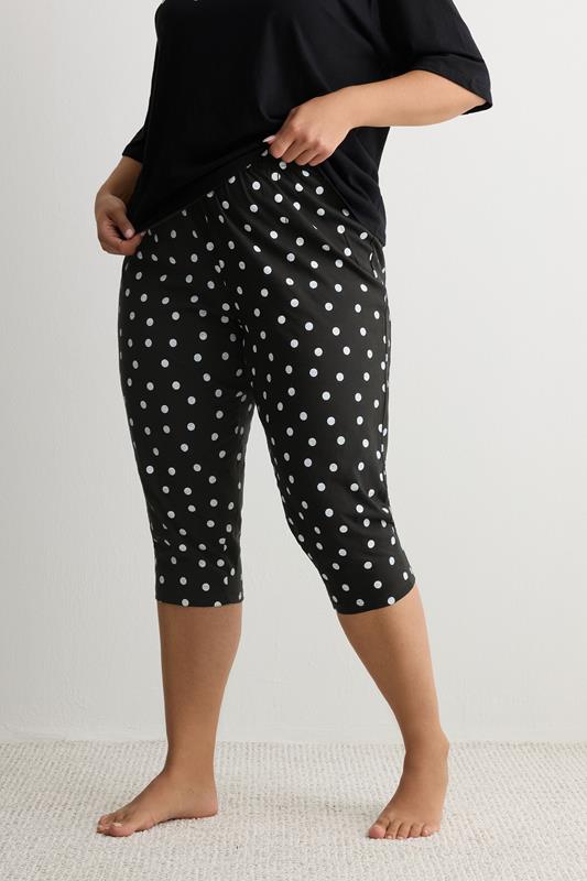 YOURS Plus Size Black Polka Dot Wide Leg Pyjama Cropped Bottoms | Yours Clothing 1