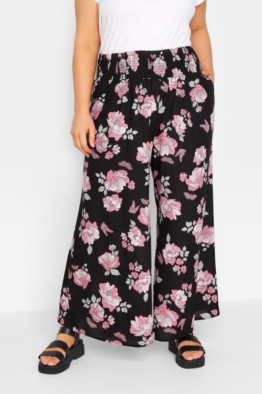 YOURS Plus Size Black Butterfly Print Shirred Waist Wide Leg Trousers | Yours Clothing 1