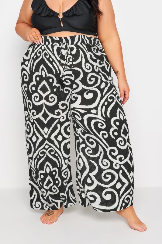 YOURS Plus Size Black Abstract Print Crinkle Tassel Trousers | Yours Clothing 1