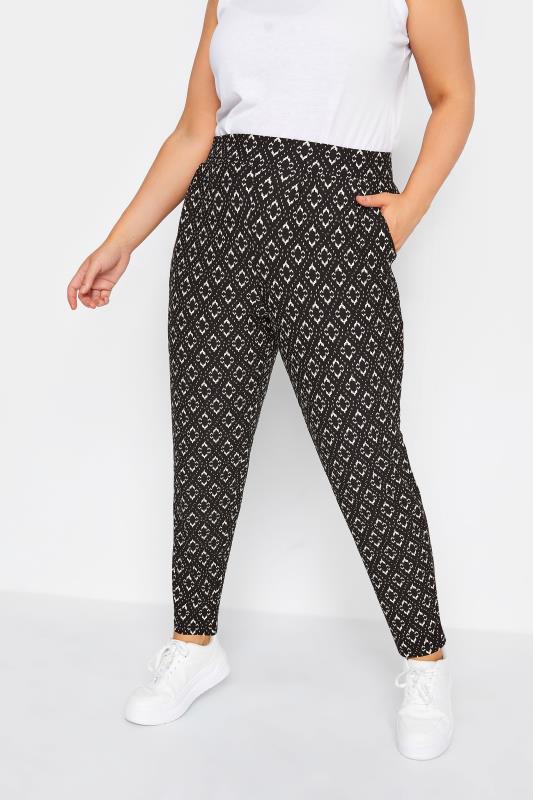YOURS Plus Size Black Abstract Print Double Pleat Harem Trousers | Yours Clothing 1