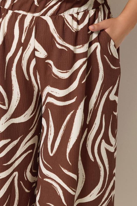 YOURS Plus Size Brown Abstract Cropped Wide Leg Trousers | Yours Clothing 4