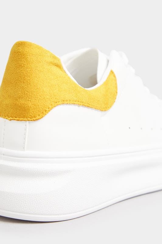 White Trainers With Yellow Trim 