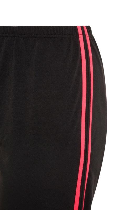 black joggers with pink stripe