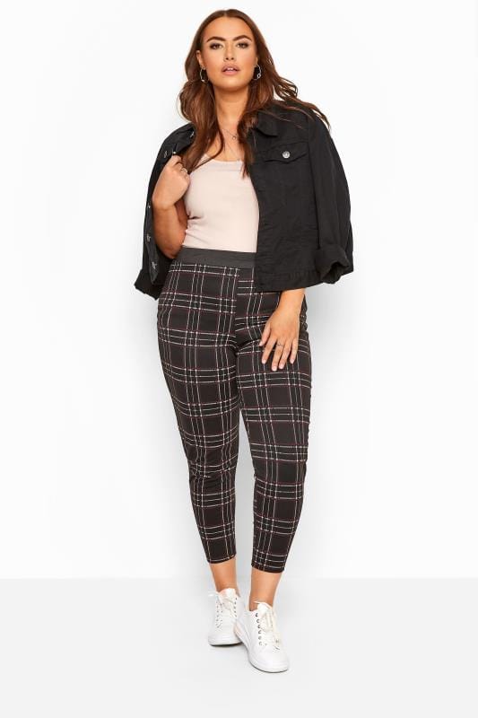 red and black check trousers