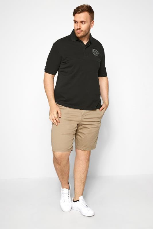 black polo shirt and shorts