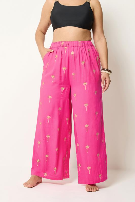 YOURS Plus Size Pink Foil Palm Tree Beach Trousers | Yours Clothing 1