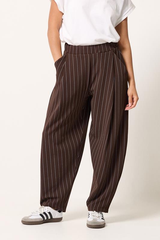 PixieGirl Petite Women's Chocolate Brown Pinstripe Barrel Leg Trousers | PixieGirl 1