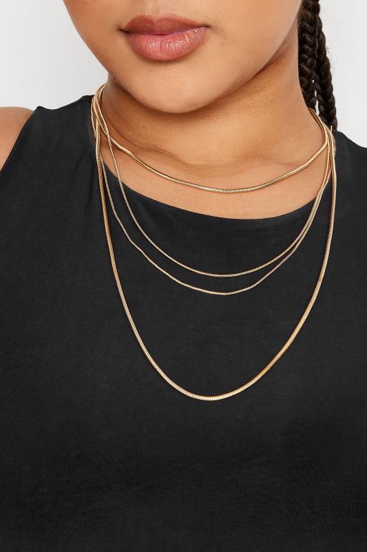  Gold Tone Multi Layered Necklace