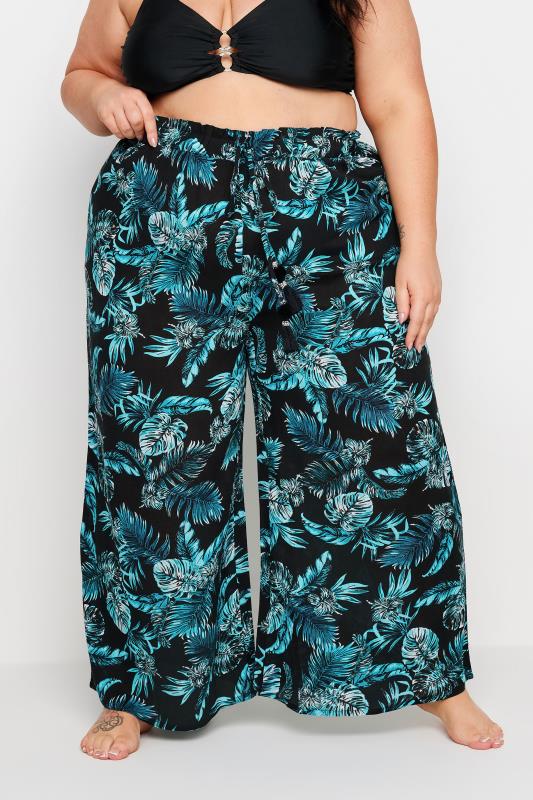YOURS Plus Size Black Tropical Print Crinkle Tassel Trousers | Yours Clothing 1