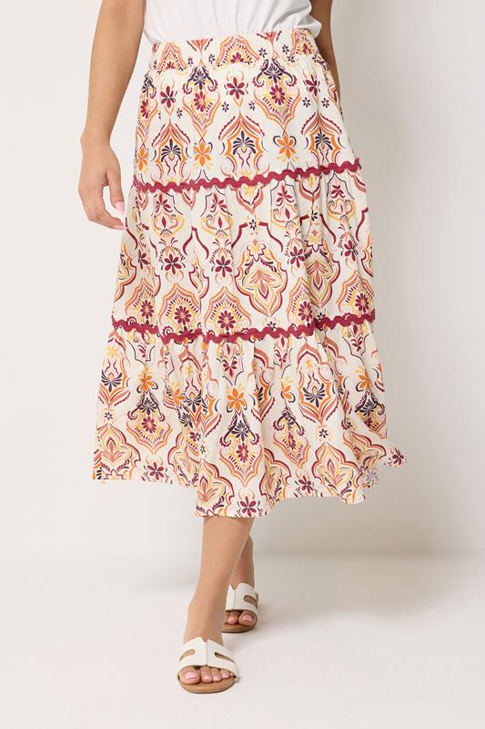  M&Co Petite Maxirock in Orange mit abstraktem Muster