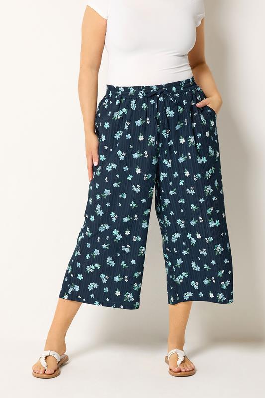 YOURS Plus Size Navy Blue Floral Crop Trousers | Yours Clothing 1