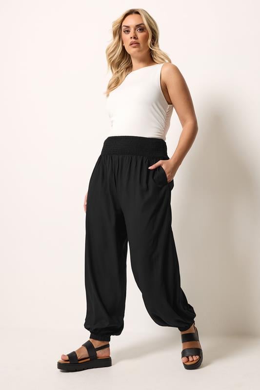 YOURS Plus Size Black Balloon Shirred Waist Trousers | Yours Clothing 1