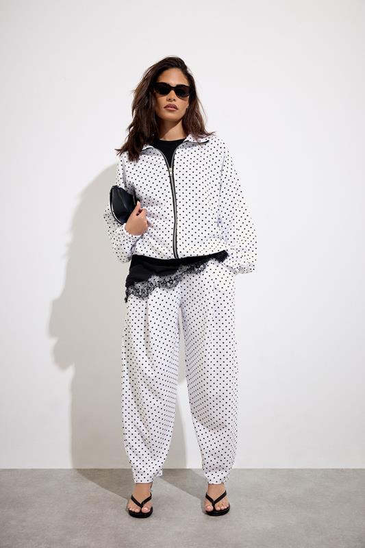 PixieGirl Petite Women's White Polka Dot Crinkle Barrel Leg Trousers | PixieGirl 1