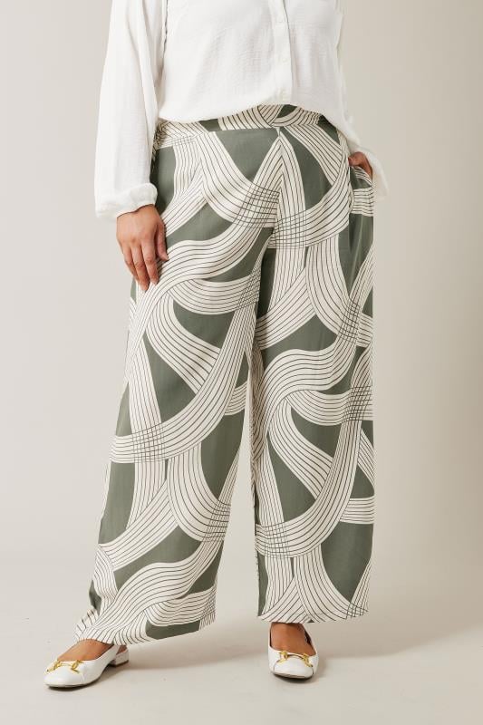 EVANS Plus Size Olive Green Linear Print Wide Leg Trousers | Evans 1