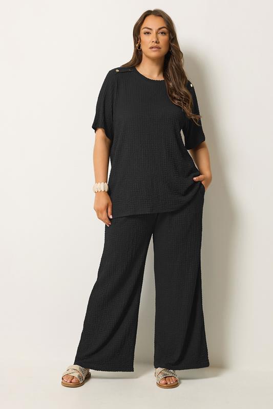 YOURS Plus Size Black Bubble Texture Wide Leg Trousers | Yours Clothing 1