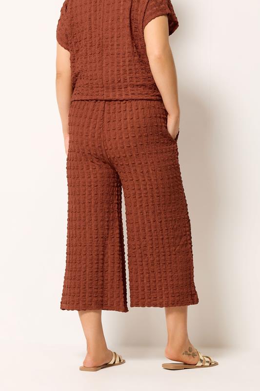YOURS Plus Size Rust Orange Bubble Textured Cropped Trousers | Yours Clothing 2