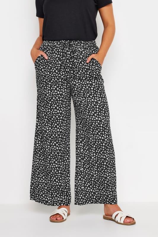 M&Co Black & White Flower Print Palazzo Trousers | M&Co 1