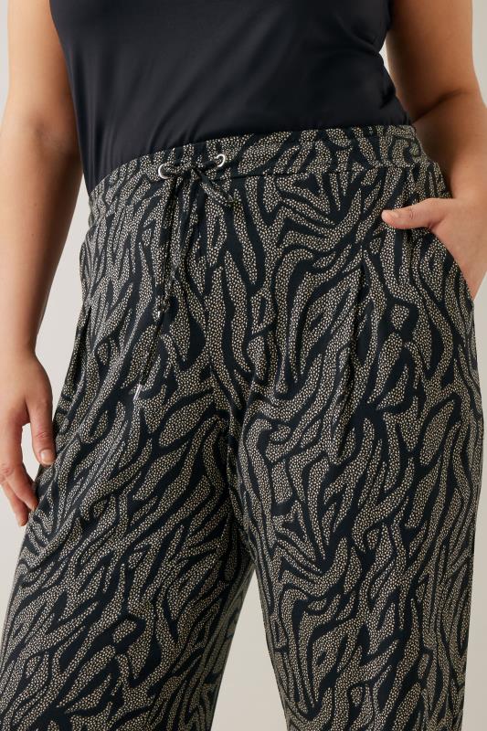 EVANS Plus Size Black Animal Markings Jersey Tapered Trousers | Evans 4