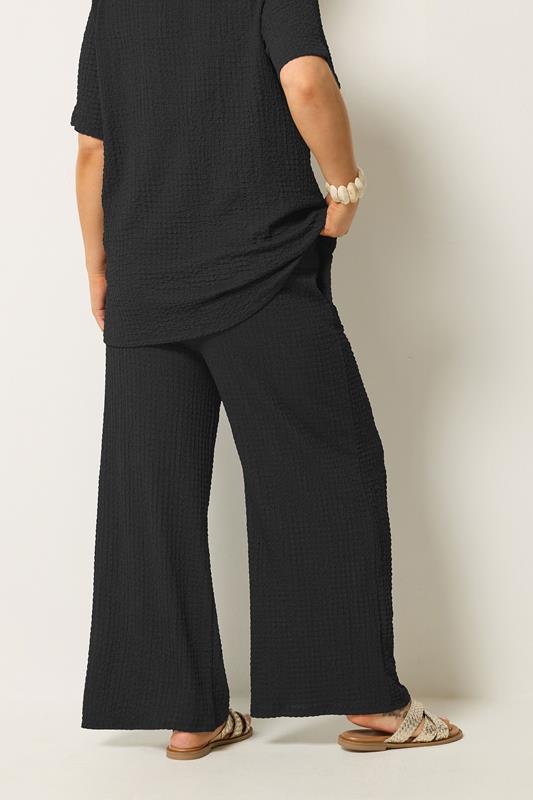 YOURS Plus Size Black Bubble Texture Wide Leg Trousers | Yours Clothing 2