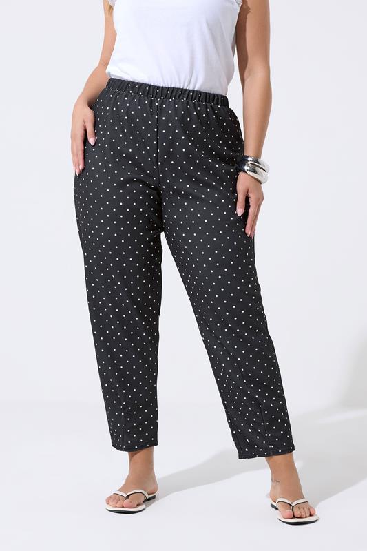 LIMITED COLLECTION Plus Size Black Polka Dot Barrel Trousers | Yours Clothing 1