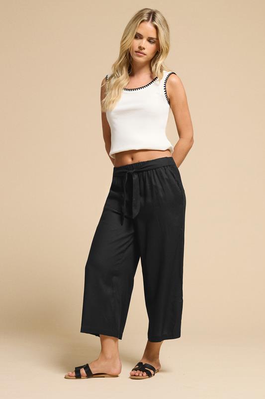 PixieGirl Petite Women's Black Cropped Belted Wide Leg Trousers | PixieGirl 1