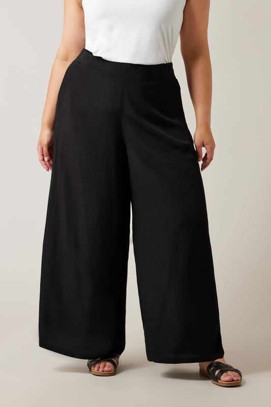 EVANS Plus Size Black Wide Leg Trousers | Evans 1