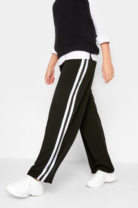 Buy Online Women Stylish Black Striped Volume Play Trousers at best price -  Pluss.in