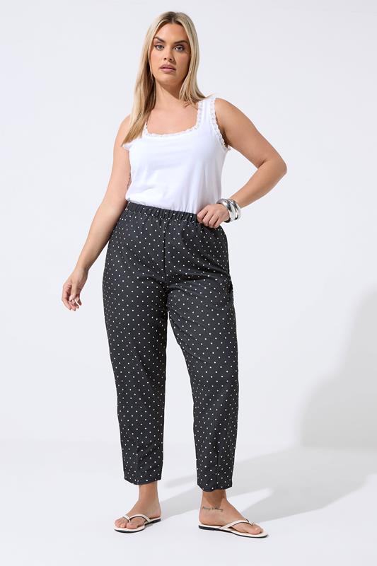 LIMITED COLLECTION Plus Size Black Polka Dot Barrel Trousers | Yours Clothing 1