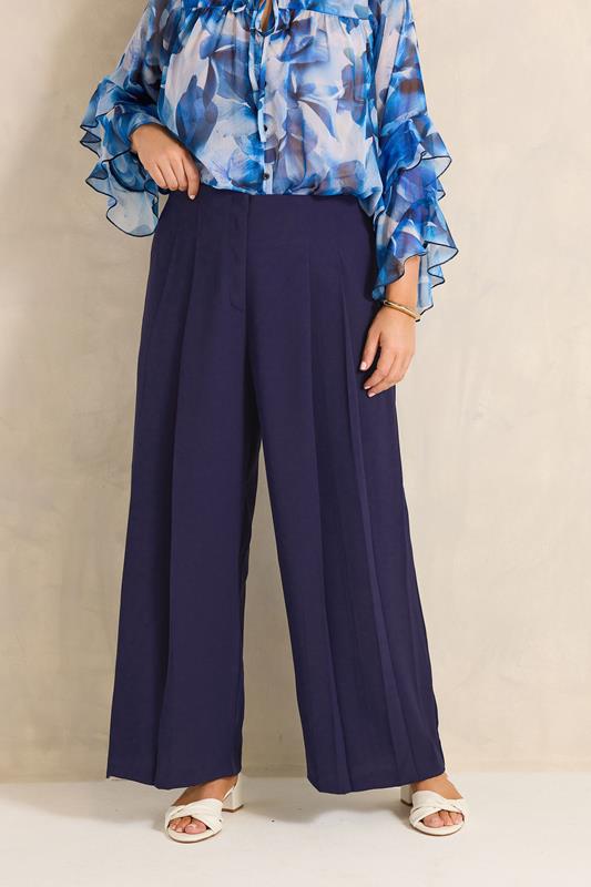 EVANS Plus Size Navy Blue Pleat Front Trousers | Evans 1