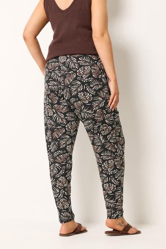 YOURS Plus Size Black Leaf Print Double Pleat Harem Trousers | Yours Clothing 2